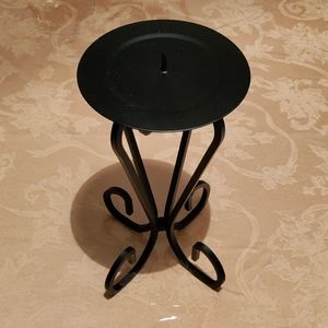 Black Matte candle holder approximately 8 3/8" high x 5 1/2" wide candle base